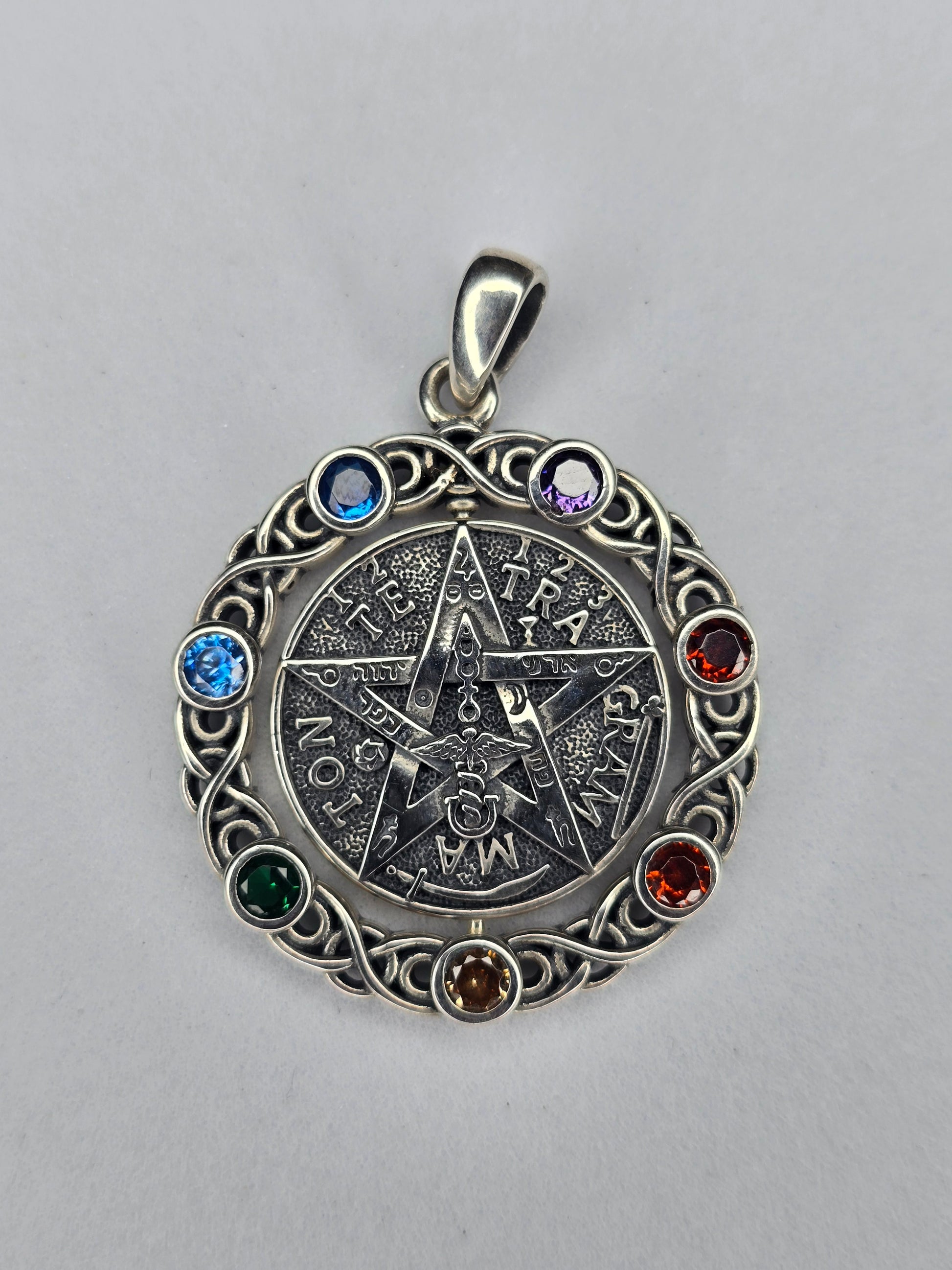 Rotatable pentagram pendant in 925 sterling silver with seven chakra stones