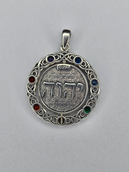 Back view of rotating pentagram pendant showing sterling silver construction and chakra stones