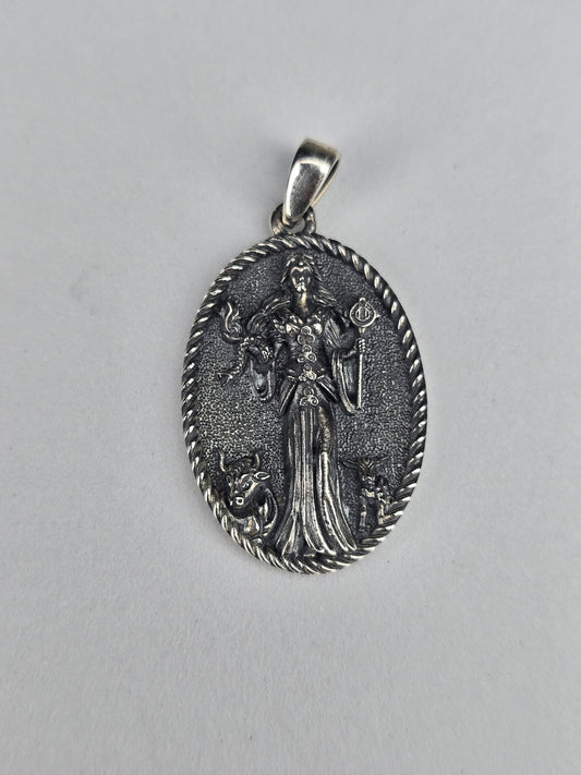 Brigid goddess pendant in 925 sterling silver with oxidised relief front
