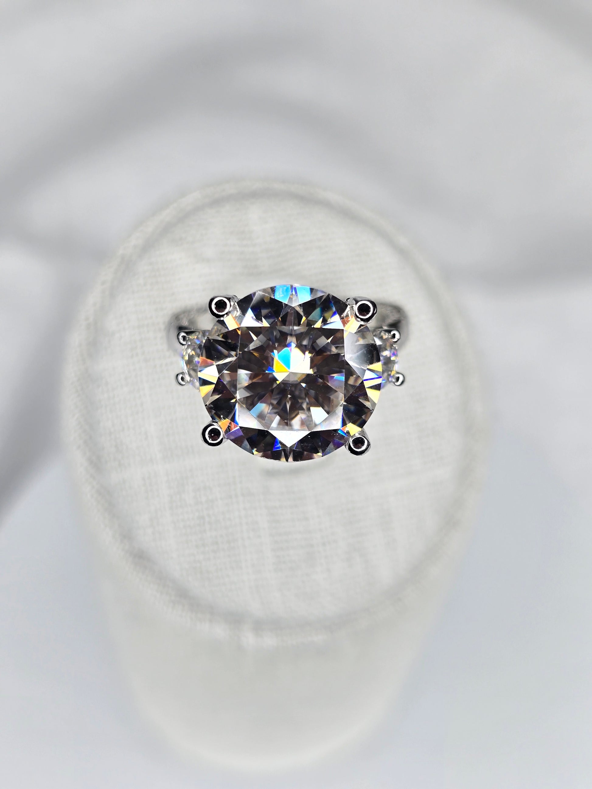 Three stone moissanite ring with 8ct center stone